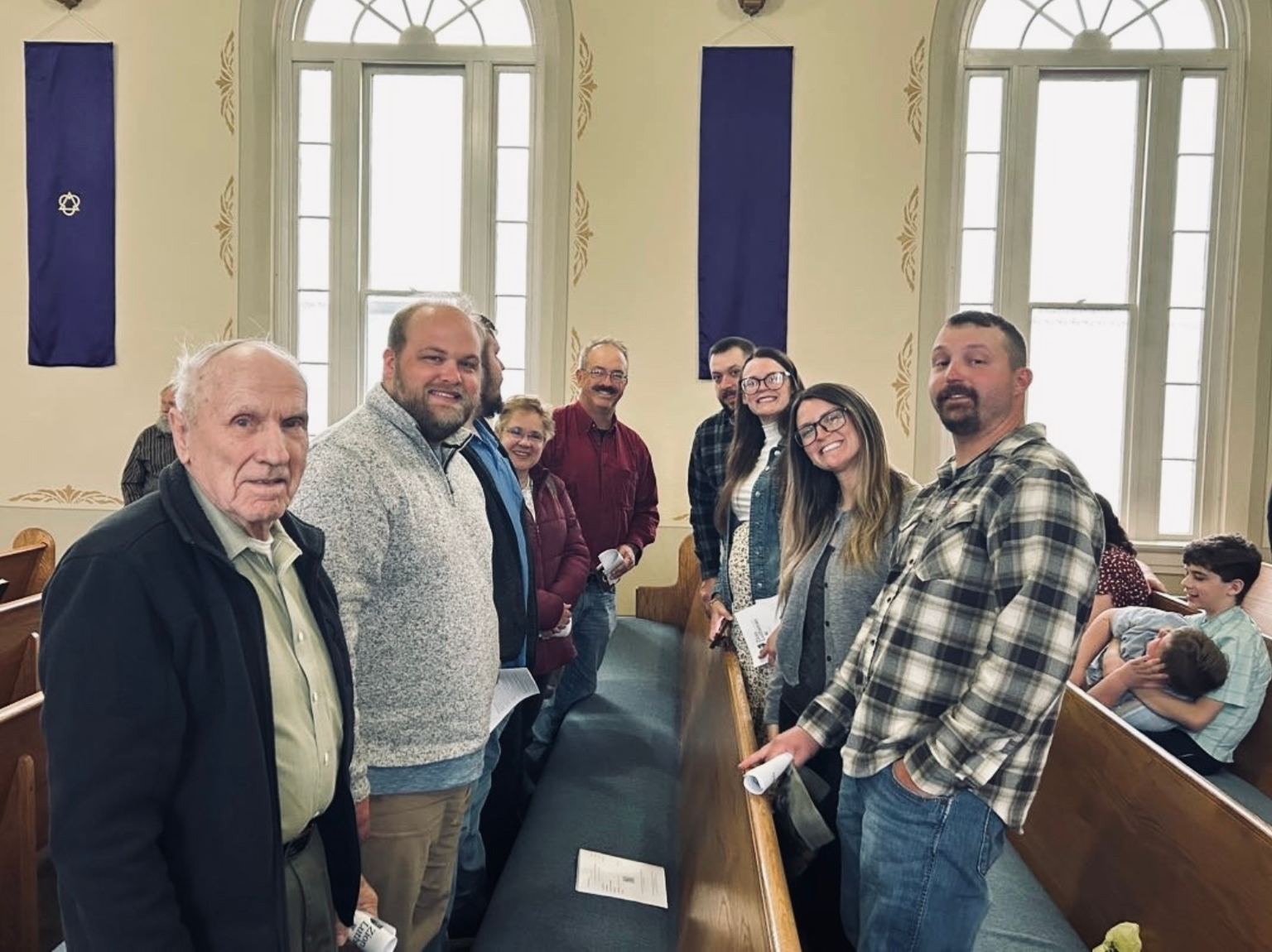 Adults woman sitting on chair in front of table white reading book