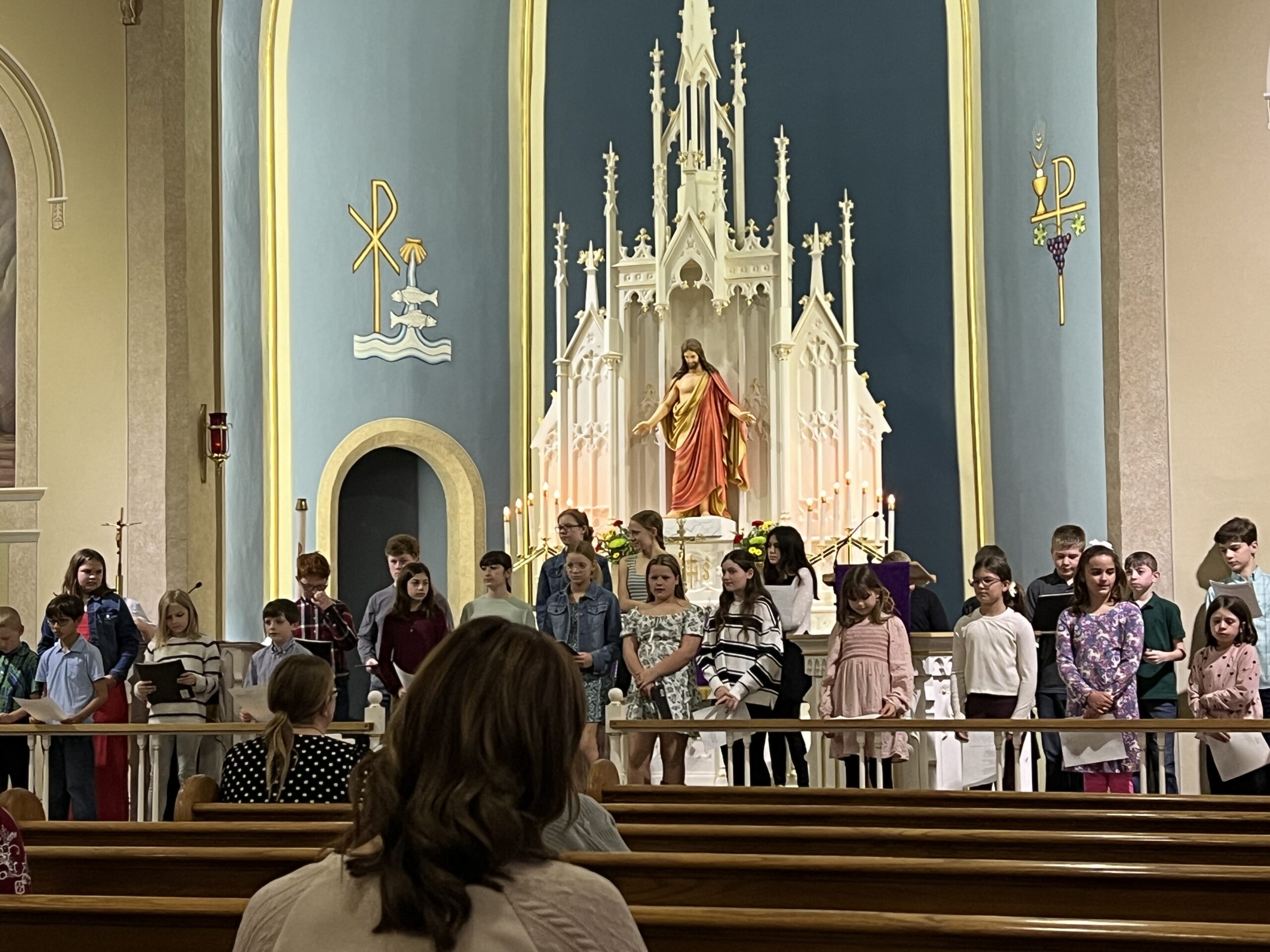 IMG_6732 people sitting on chair in front of table while holding pens during daytime